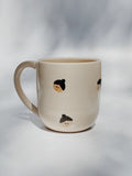 Faces Mug